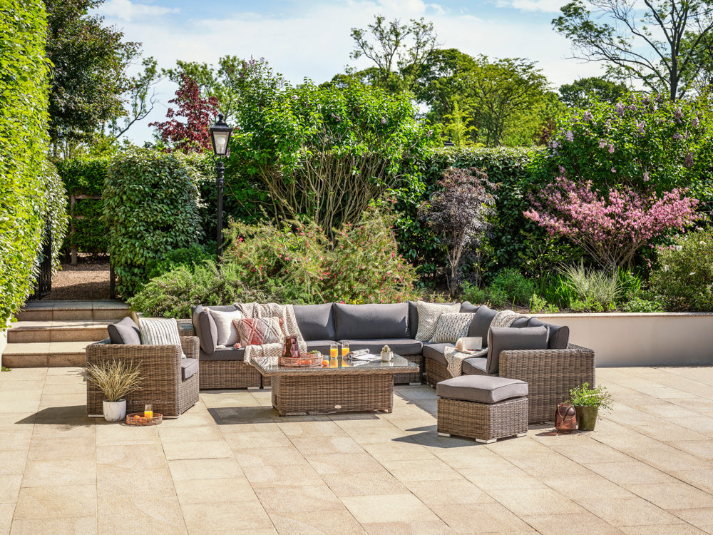 Mayfair modular rattan sofa set with adjustable height garden table.